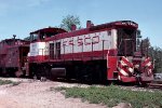 Burlington Northern MP15 #4004, pulling caboose BN #11551 off an inbound train and thru a spring switch, 